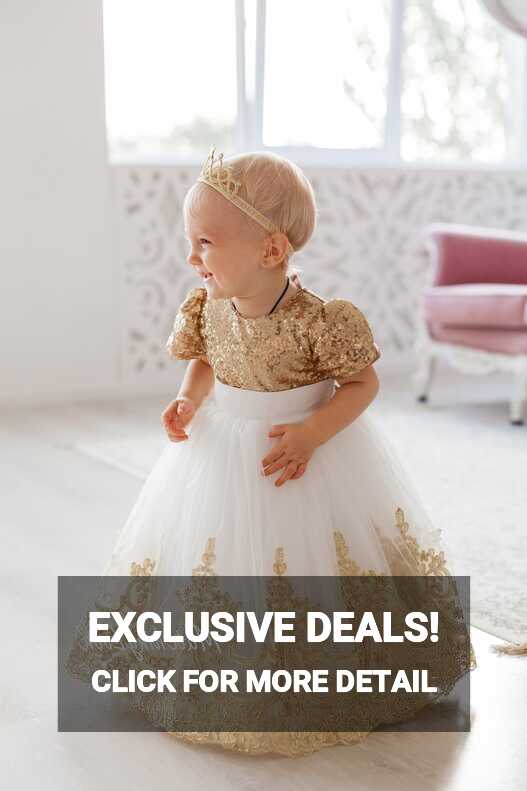 Gold baby girl princess dress with sequins and lace trim on tutu botto