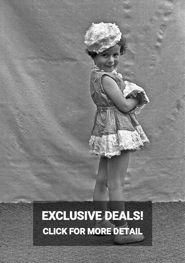 Little girl posing in a short dress Our beautiful Wall Art and ...