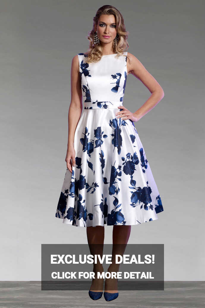 Short floral dress with full skirt. VO4650 - Catherines of Partick