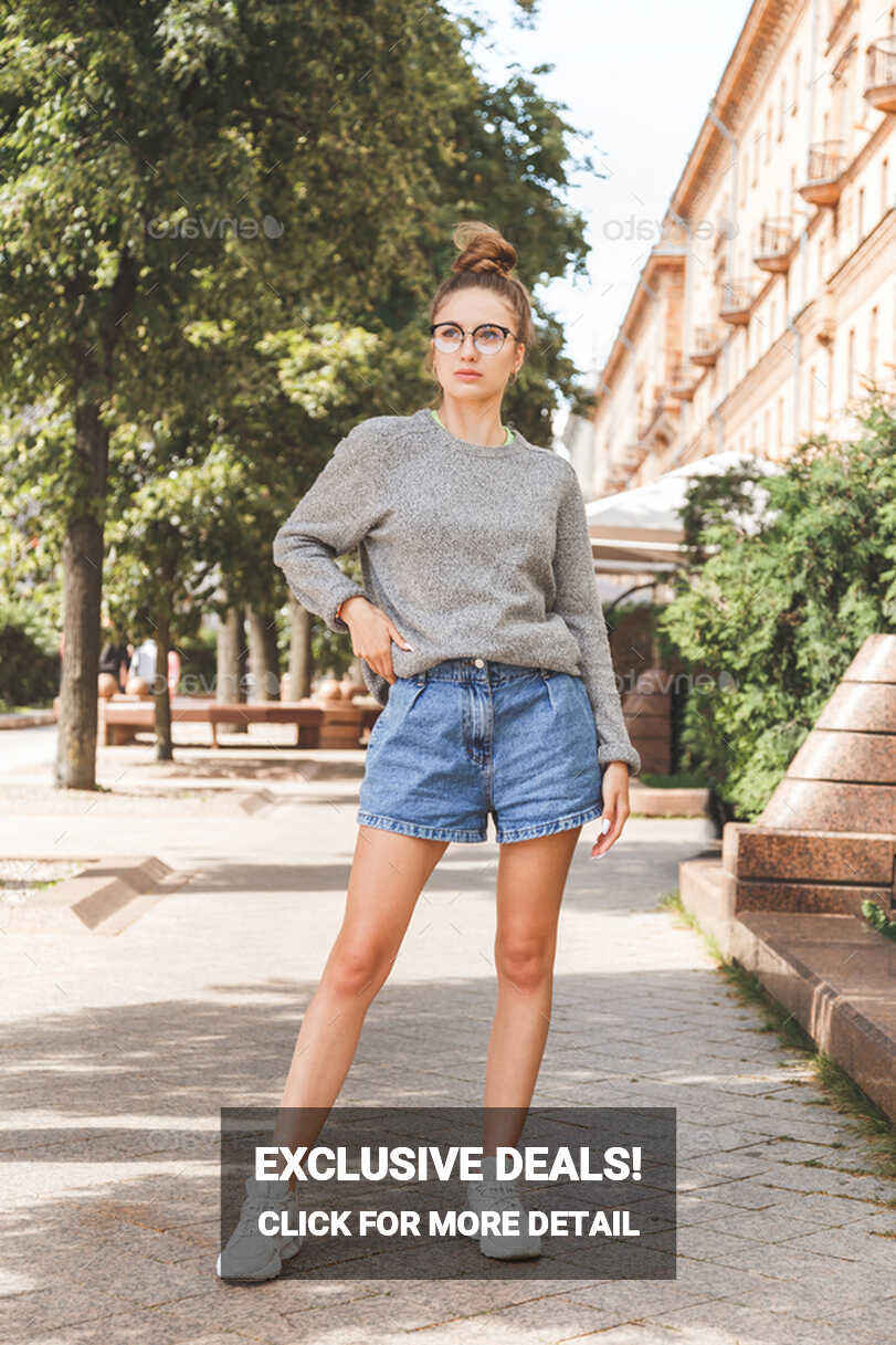 Street summer fashion portrait of young millennial girl in glasses ...