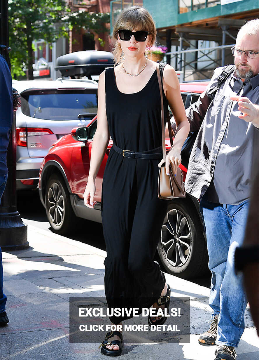 Taylor Swift Dons A Black Knit Maxi Dress And Chunky Buckled ...