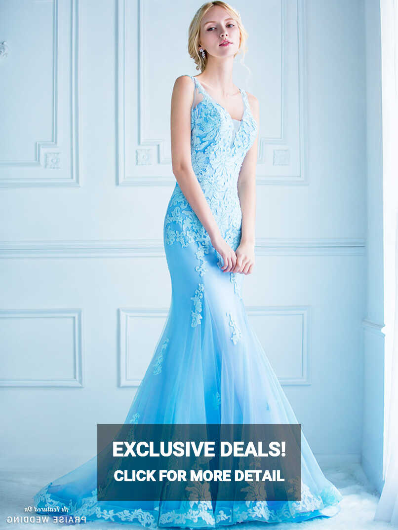 This blue mermaid gown from Digio Bridal featuring chic floral ...