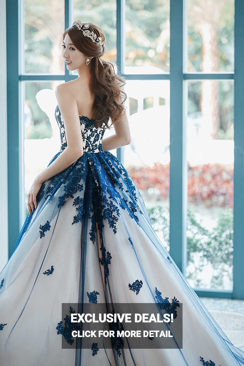 This sophisticated evening gown from Sophie Design featuring ...