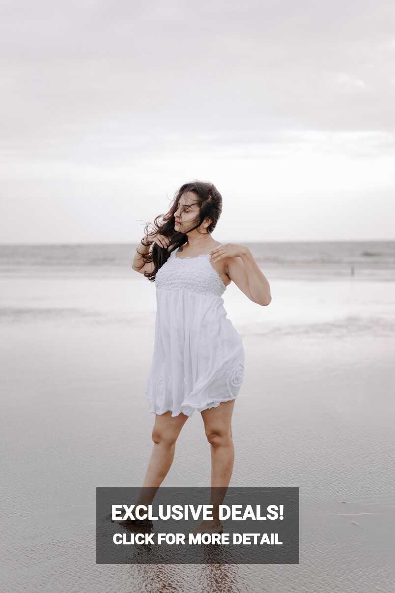 Woman Wearing White Dress on a Beach · Free Stock Photo