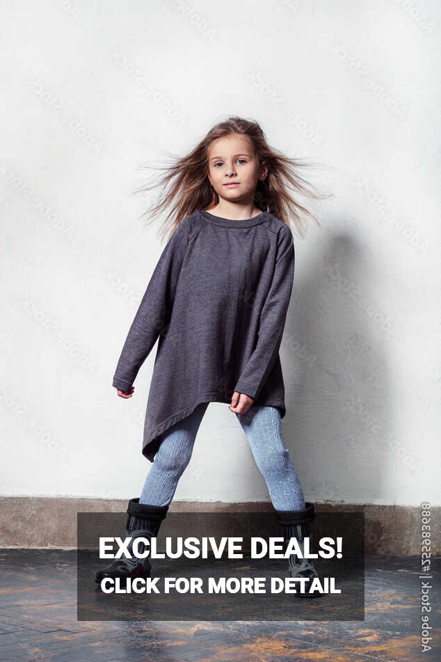 child posing in a stylish, urban, casual clothes. fashion little ...