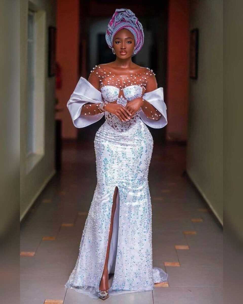 2021/2022 Latest and Sexy Aso Ebi Lace Gown Styles. - Ladeey