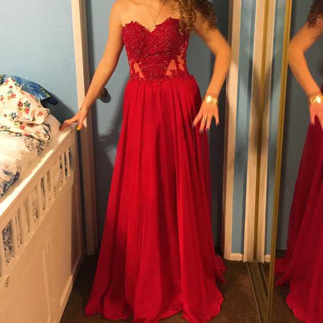 A beautiful red prom dress! The top is a corset... - Depop