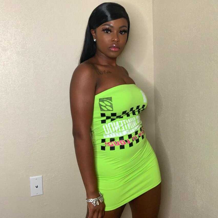 A neon green Super Nintendo tube dress that fits... - Depop