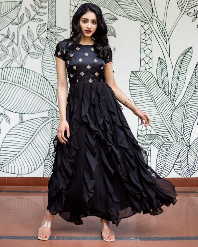 Black embroidered ruffled dress by Athira Designs | The Secret Label