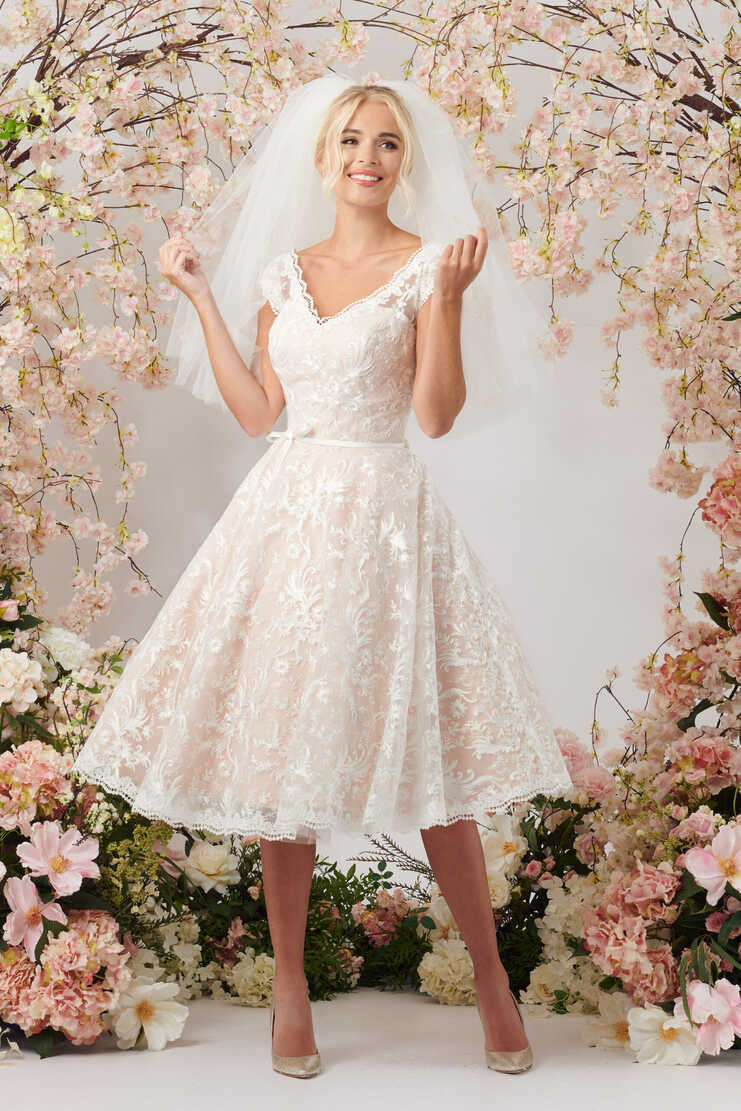 Cute blush and ivory short tea length lace wedding dress