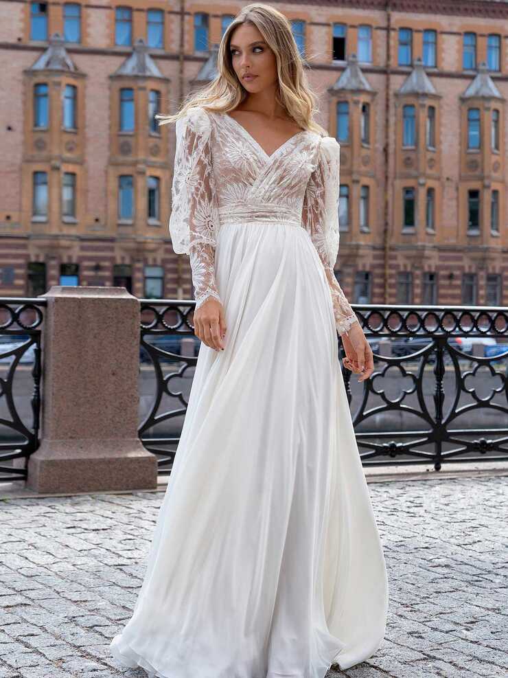 Long sleeve wedding dress with a flowy skirt