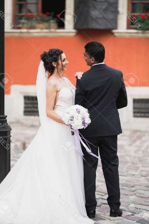 Lovely Happy Wedding Couple, Bride With Long White Dress Posing In ...