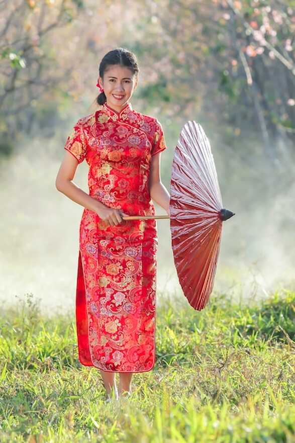 Premium Photo | Chinese girl with dress traditional Cheongsam in ...