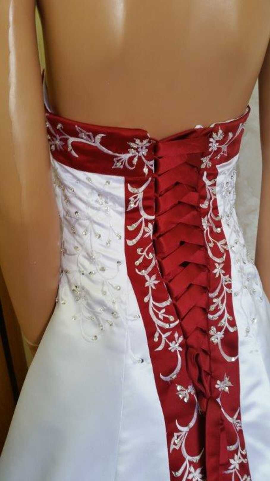 Red white lace embroidered wedding dress.