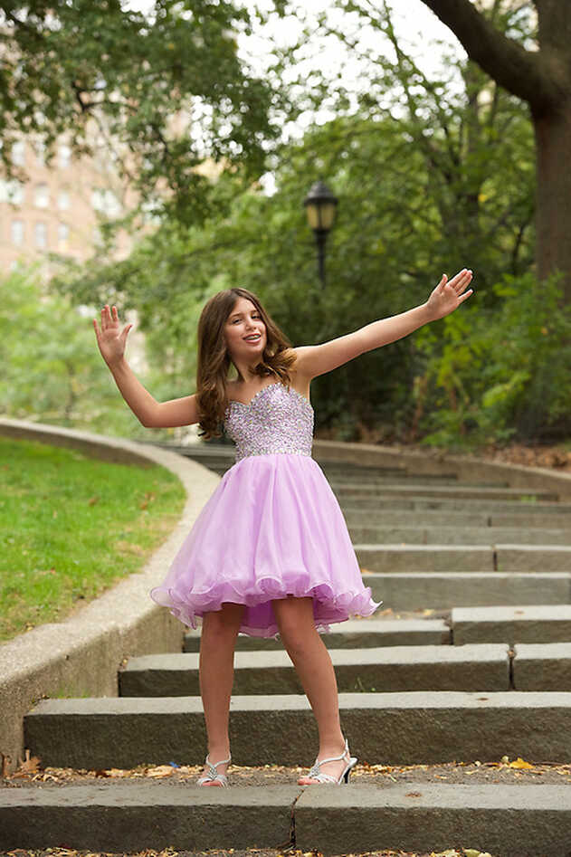 Thirteen year old girl portrait in party dress. | David Gordon