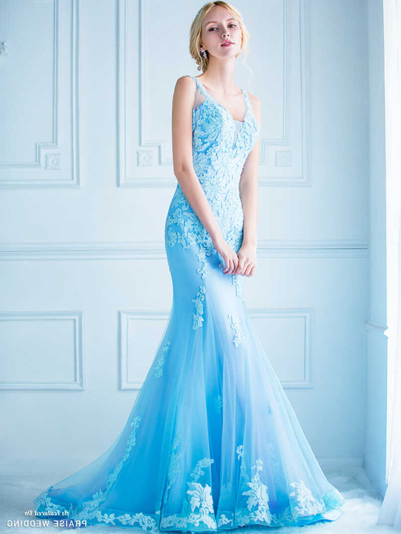 This blue mermaid gown from Digio Bridal featuring chic floral ...