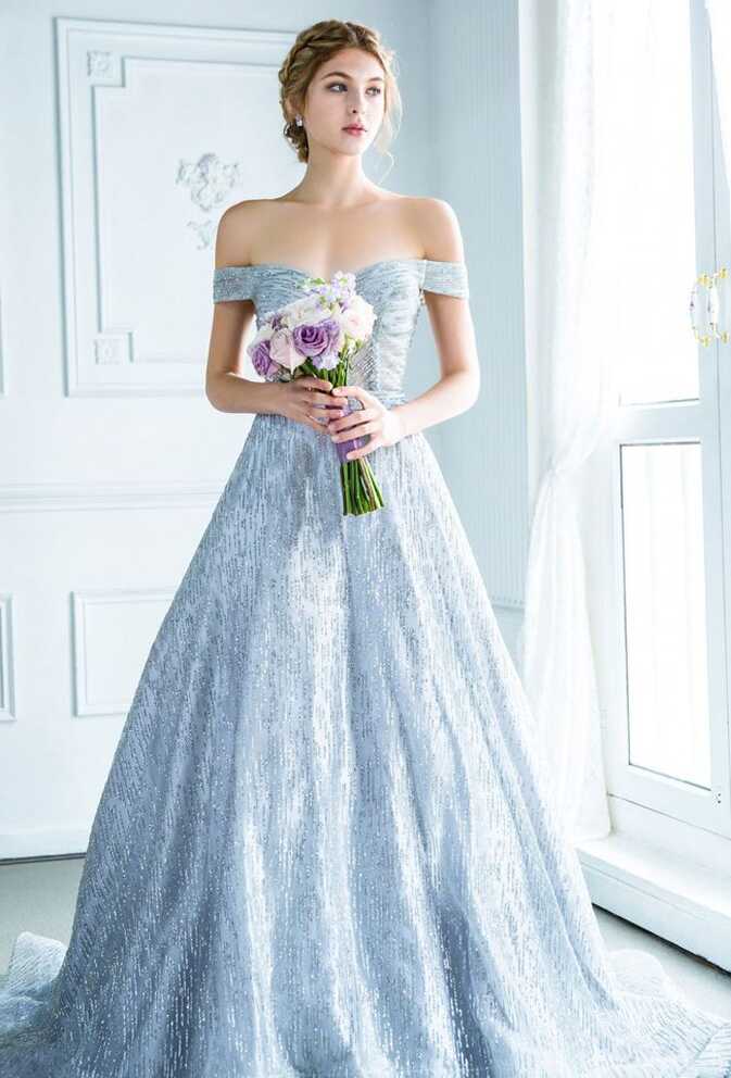 This off-the-shoulder ice blue gown from Digio Bridal featuring ...