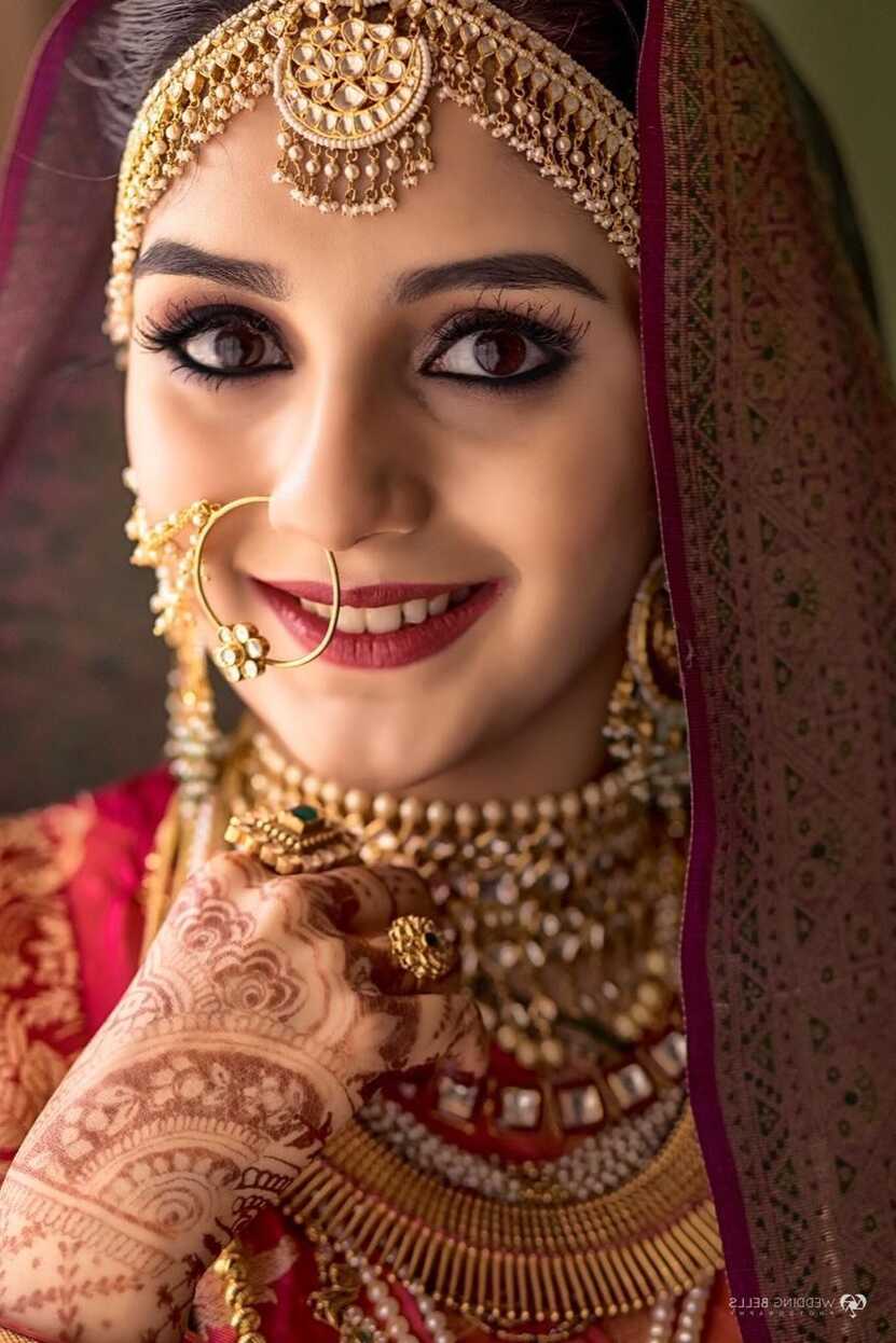 Traditional Indian Bride In Red And Gold