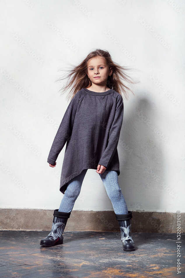 child posing in a stylish, urban, casual clothes. fashion little ...